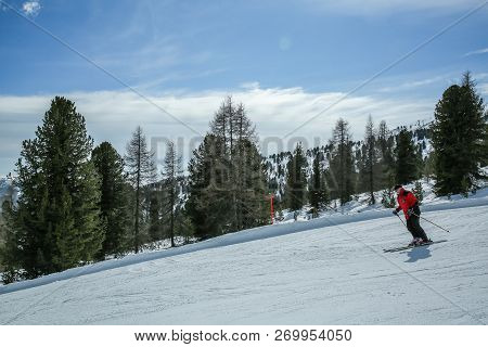Kreischberg, Murau, Austria - March 15, 2017: Man Skier Running Downhill On Sunny Alpine Slope