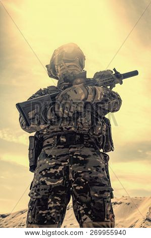 Military Airsoft Soldier Reenactment Participant With Rifle
