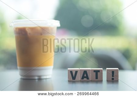 Wooden Blocks With Letters Vat. Vat Is Acronym From Word Value Added Tax. Vat Payment From Customer 