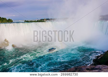Inspiring View Of Niagara Falls With Rainbow