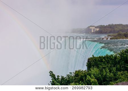 Inspiring View Of Niagara Falls With Rainbow