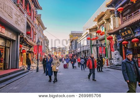 Beijing/china - 24 February 2017:unacquainted Chinese People Or Tourist Walking In Qianmen Street Th