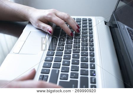 Woman Typing On Laptop Pc