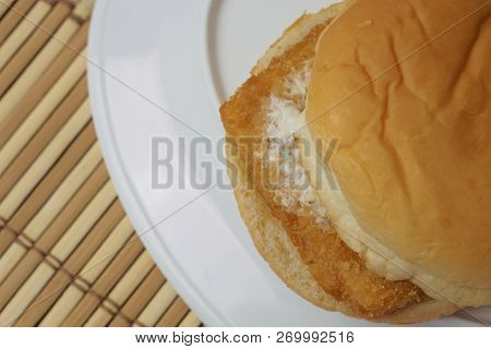 Low Cost Burger Fish Steak On Bamboo Mat