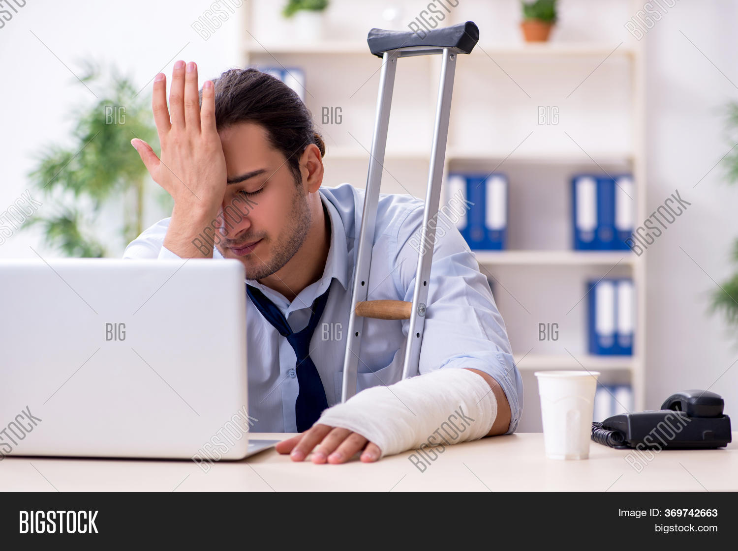 Injured Male Employee Image & Photo (Free Trial) Bigstock