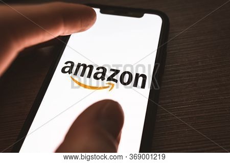 Aws Logo On The Smartphone Screen. Amazon Web Services. High Quality Photo.