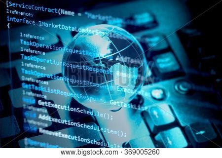 Programming Code, World Transparent Globe Earth On Computer Keyboard. Global Communications Business