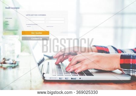 Concept Buy Health Insurance Online . Hand Of Women Using Laptop For To Make Online Health Insurance