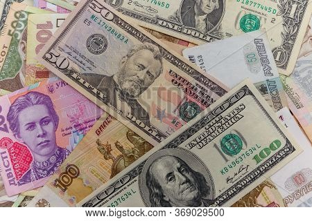 Multicurrency Background Of The Us Dollars, Russian Rubles And Ukrainian Hryvnias