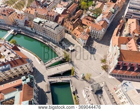 Aerial Drone View Of Preseren Squere And Triple Bridge Over Ljubljanica River, Tromostovje, Ljubljan