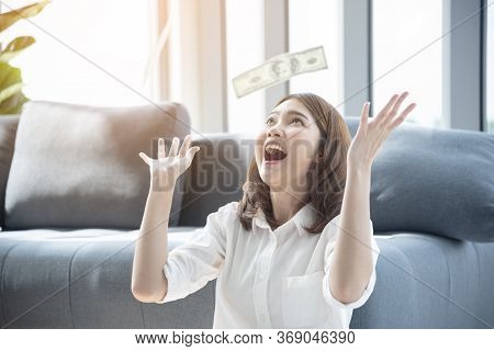 Woman Excited With Money Dollar Banknote Rain Fall. Happy Start Up Business Woman Got Winner Lucky D