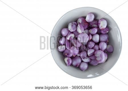 Peeled Whole Shallot In A Bowl Isolated On White Background Included Clipping Path.