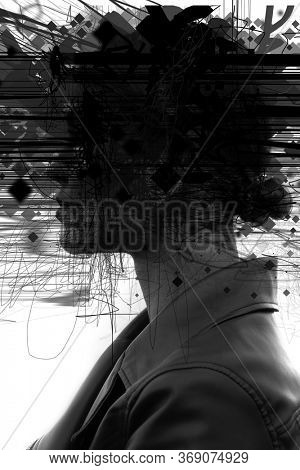 Close up profile portrait of an attractive, woman with blonde hair and a serious expression