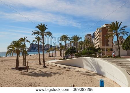 Benidorm, Alicante, Spain - November 27, 2019: People Walk Along The Fantastic Modern Promenade Of P