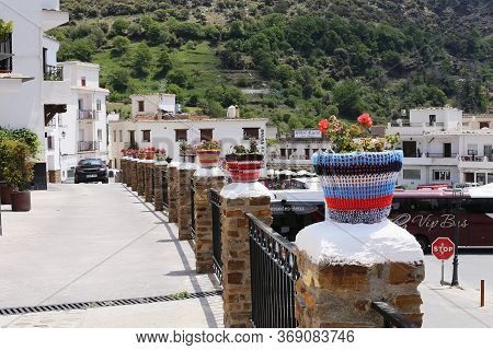 Treveles, Andalusia, Spain - May 29, 2019: A Street Full Of Typical Crafts Decorated With Flower Pot