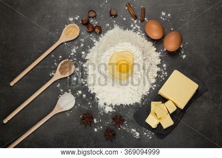 Baking Cake Ingredients. Bowl, Flour, Eggs, Egg Whites Foam, Eggbeater On Black Chalkboard From Abov