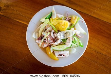 Fresh Squid With Pineapple In Restaurant