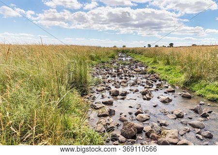 Shallow River Daliyot Flowing Near The Remnants Of The Early Bronze Age Megalithic Complex Of The Ea