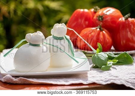 Fresh Italian Soft Cheese Burrata Or Burratina Served On Outdoor Terrace In Sunny Day