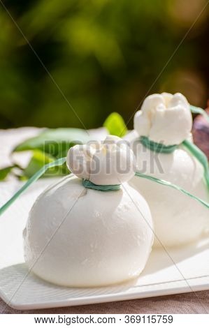 Fresh Italian Soft Cheese Burrata Or Burratina Served On Outdoor Terrace In Sunny Day