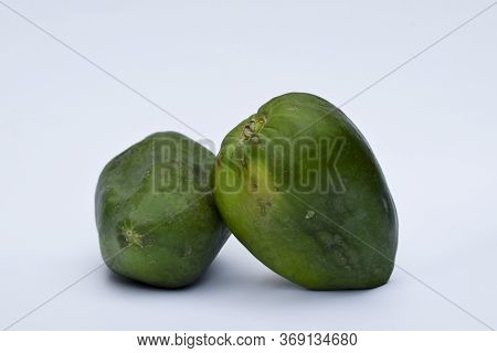 Two Green Papaya, Papaw Or Pawpaw Or Raw Papaya Fruit Indian Mexico American Used For Cuisine Cookin