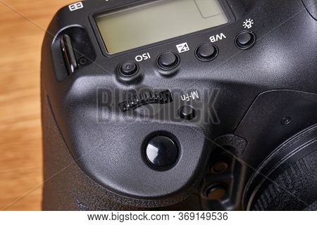 DSLR camera detail, shutter release button and grip