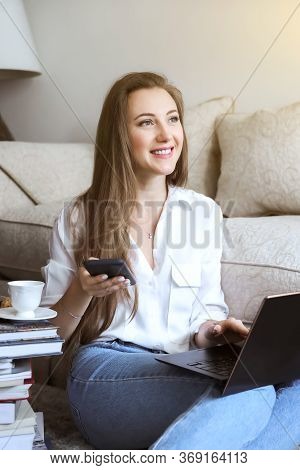 Young Student Watching Lesson Online And Studying From Home Drinking Coffee. Young Woman Working Fro