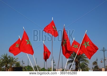 Morocco National Flags Waving In The Wind. Selective Focus