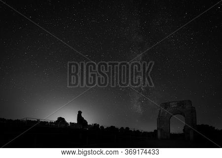Night Photography In The Roman Ruins Of Caparra. Extremadura. Spain.