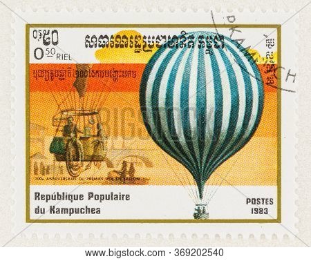 Seattle Washington - May 27, 2020: 1983 Cambodia Stamp Featuring Blue And White Striped Balloon, Com