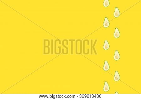 Imprints Of Tracks From Halves Of An Avocado, Passing Along The Right Edge On A Yellow Background. T
