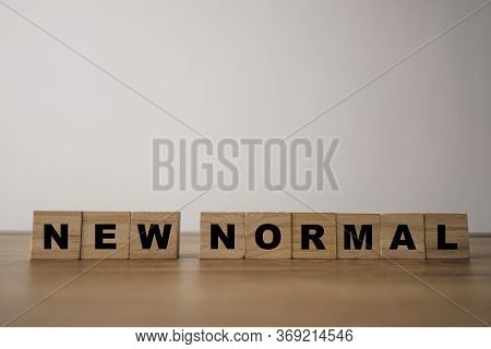 Wooden Block Cubes For  New Normal Wording. The World Is Changing To Balance It Into New Normal Incl