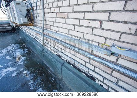 Russia, Saint-petersburg - April 30, 2018: Cables Are Near Of Climatic Vandal-proof Cabinet With Mic