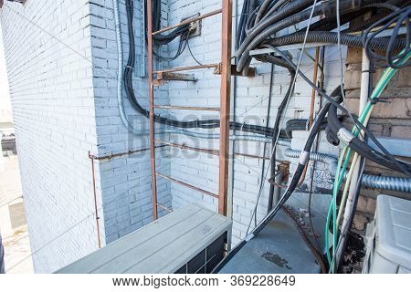 Russia, Saint-petersburg - April 30, 2018: Cables Are Near Of Climatic Vandal-proof Cabinet With Mic