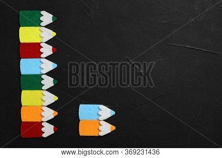 Flat Lay Composition With Colorful Felt Pencils On Black Stone Background, Space For Text. Pareto Pr