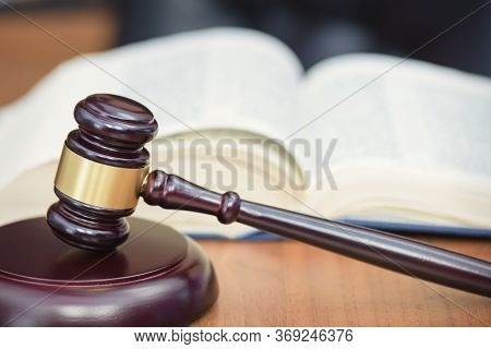 Book, Judges Gavel, Criminal Codex On The Judges Table. Concept Of Law And Order. Table Of The Judge