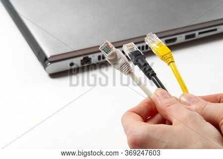 Lan Wires Cat5 Cat6. Hand Holds Wires With High Speed Internet Access. Internet Technologies Of The 