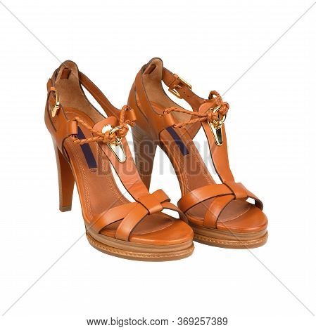 Stylish Summer High Heels Female Light Brown Leather Shoes. Isolated On White 
Background