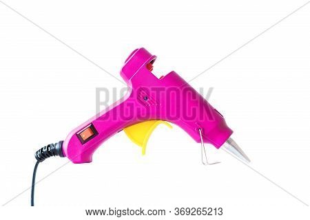 Pink Hot Glue Gun Isolated On A White Background.