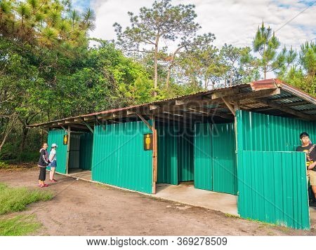Loei/thailand-17 Feb 2019:unacquainted Tourist With Green Toilet On Lomsak Cliff On Phu Kradueng Mou
