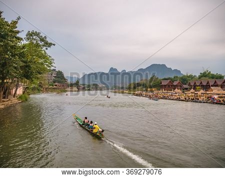 Vangvieng/lao-4 Dec 2017:unacquainted Tourist Kayaking On Nam Song River In Vangvieng Lao.vangvieng 