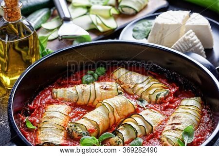 Zucchini Lasagna Rolls Stuffed With Ricotta Mix Of Fresh Baby Spinach,  Basil Baked In Tomato Sauce 