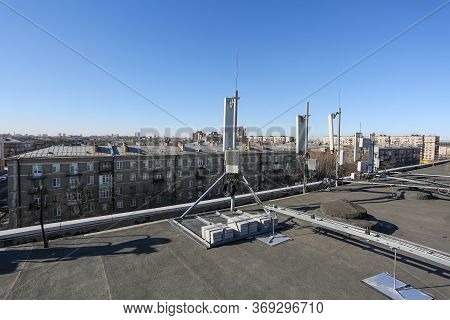 Russia, Saint-petersburg - April 30, 2018: Panel Antenna Of 5g, 4g, 3g, 2g Bands, Optical Fibers, Po