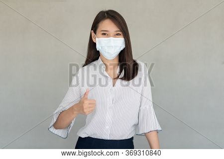 Business Employees Wearing Mask During Work In Office To Keep Hygiene Follow Company Policy.preventi