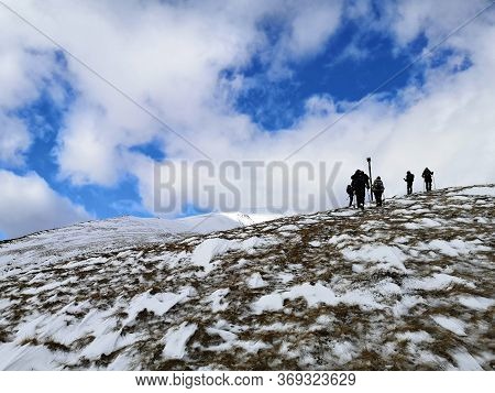 Trekking In The Mountains. Winter Landscape In The Mountains