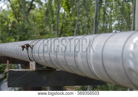 Insulated Heating Circuit Of Centralized Heating Outdoors. Pipeline Coated With Galvanized Sheet Met
