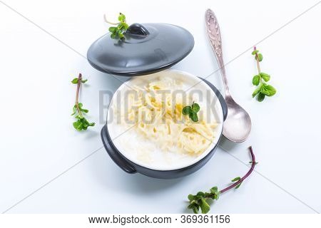 Sweet Boiled Vermicelli With Milk In A Ceramic Bowl
