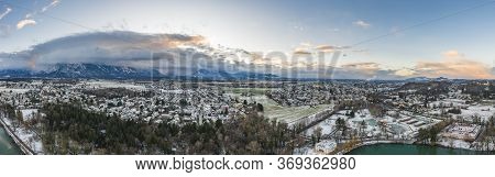 Aerial Drone Shot View Of Outskirts And Austrian Alps Untersberg With Heavy Fog In Winter