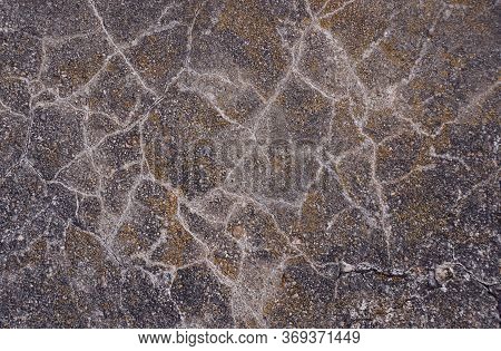 Broken Asphalt. Horizontal Abstract Background. Old Highway. Charcoal Black Pavement. Gray Rusty Con