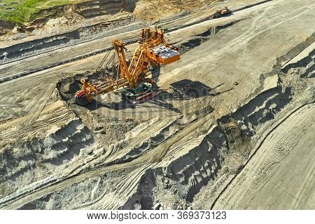Bucket-wheel Excavator For Surface Mining In A Lignite Quarry, Heavy Industry Of Coal Mining.